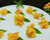 A picture of step 18 of Khasta flower mathri.