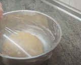 Foto del paso 2 de la receta: Buñuelos de masa madre rellenos con crema pastelera