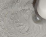 A picture of step 8 of Mango Pudding Delight 3 layered.