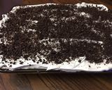 A picture of step 5 of Cookies and cream poke cake.