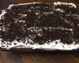 A picture of step 5 of Cookies and cream poke cake.