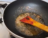 A picture of step 2 of Green garlic, green chilli ginger pickle.
