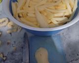 A picture of step 1 of KFC STYLE CRUNCHY FRENCH FRIES😋.