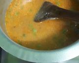 A picture of step 7 of Garden peas in coconut curry.