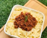 A picture of step 6 of Jamaican style Corned beef x farfalle pasta.