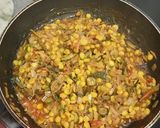 A picture of step 5 of Bitter gourd with chana dal masala.