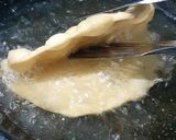 A picture of step 7 of Taco bell special Beans Chalupa.
