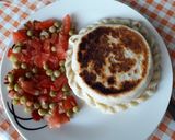 Foto del paso 5 de la receta: Tartita rellena de atún, arvejas, zapallito, zanahoria y queso
