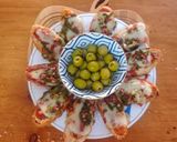 Foto del paso 4 de la receta: Crostini caliente de queso, pesto y jamón