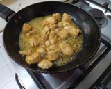 A picture of step 2 of Instant chicken Tikka Pizza in frying pan.