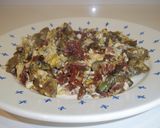 Foto del paso 8 de la receta Alcachofas con jamón y huevo