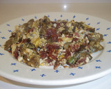 Foto del paso 8 de la receta: Alcachofas con jamón y huevo