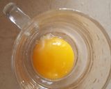 A picture of step 1 of Half fry star egg.