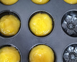 Foto del paso 5 de la receta: Pastelitos de mandarina con coco