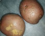 A picture of step 1 of Garlic buttery potato wedges.