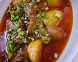 A picture of step 10 of Aloo gosht.