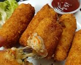 A picture of step 12 of Chicken,Aalu, cheez,roll.