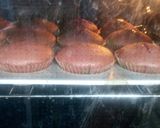 A picture of step 11 of Red and green velvet cupcakes with fudge icing.