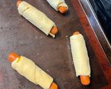 A picture of step 8 of Pigs in a Blanket.