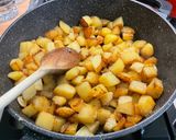 Une image de l'étape 8 de Pommes de terre sautées aux oignons nouveaux.
