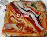 A picture of step 13 of Parle-G Biscuits Brownie with Mirror Glaze Effect.