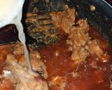 A picture of step 4 of Chicken Korma.