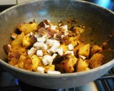 A picture of step 4 of Kohlrabi stir-fried with coconut.