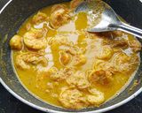 A picture of step 5 of Machher Jhaal / Fish in Mustard curry.