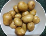 A picture of step 1 of Malai Dum Aloo with Green Peas.