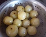 A picture of step 1 of Amla murabba with jaggery.