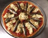 Une image de l'étape 12 de Pizza maison tomates anchois poivrons artichauts mozzarella di buffala et câpres italiennes.