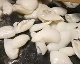 A picture of step 1 of Seppie e patate in umido squid and potato stew.