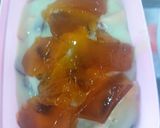 A picture of step 3 of Pista fruit custard orange jelly with black currant sauce.