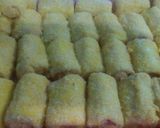 Foto langkah ke 9 dari resep Roti Gulung Sosis Simpel.