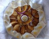 A picture of step 2 of Potato wedges and feta pie.