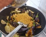 A picture of step 2 of Stuffed Brinjal potatoes in gravy.