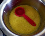 A picture of step 2 of Mango Sooji Cake.