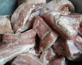 A picture of step 1 of Arroz con Chancho.