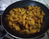 A picture of step 4 of Amla Pickle.