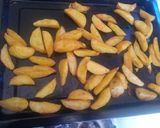 A picture of step 5 of Baked turmeric potato wedges.