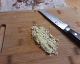 A picture of step 3 of Savory Garlic and Herb Baked Brie.