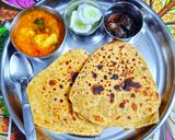 तिकोना बेसन परांठा और आलू टमाटर की चटपटी सब्जी रेसिपी चरण 9 फोटो