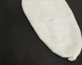 A picture of step 5 of Jingalov hats Armenian herb stuffed flatbread .