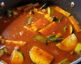 A picture of step 3 of Zucchini Tomato Italian Sausage Soup.