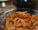 A picture of step 14 of Crispy brown onions.