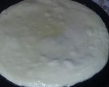 A picture of step 3 of Puri paratha in tawa style.