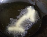 A picture of step 6 of Churros.