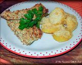 Foto del passaggio 6 della ricetta Filetti di Branzino in crosta di frutta secca con patate "Sabbiate"