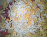 Foto del paso 2 de la receta: 😋DELI 😋 fideos con manteca huevo y panchos👌