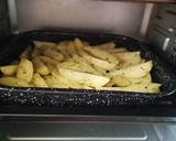 Foto del paso 4 de la receta: Alitas de pollo adobadas con patatas gajo al horno